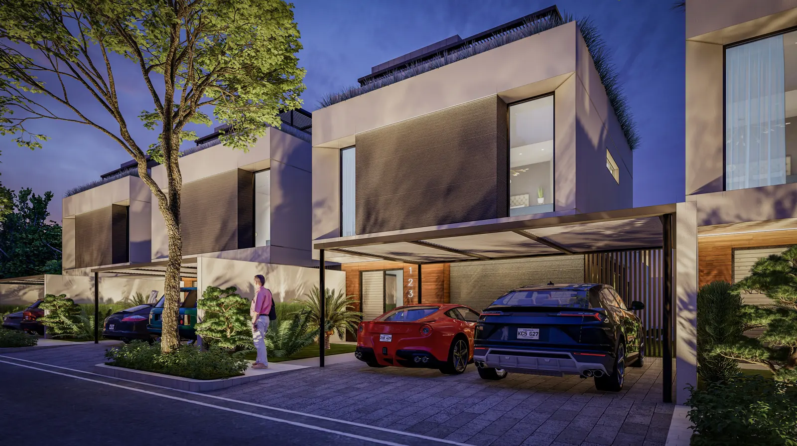 A row of two-storey villas at dusk, each with a shaded carport and a planted roof terrace, on a tree-lined residential street.